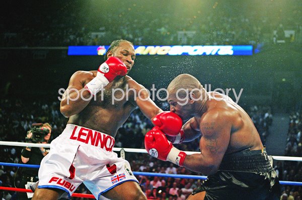 Lennox Lewis punches Mike Tyson Heavyweight Title Fight Memphis 2002