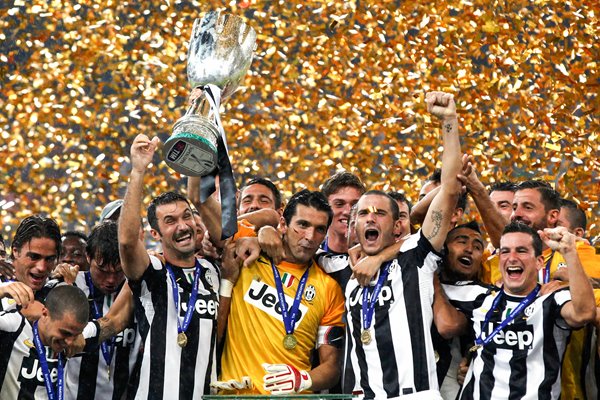 Juventus celebrate with the Italian Super Cup 2012 trophy