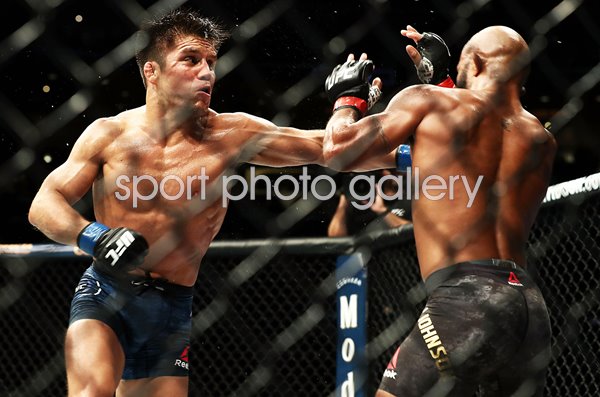 Henry Cejudo punches Demetrious Johnson Los Angeles 2018