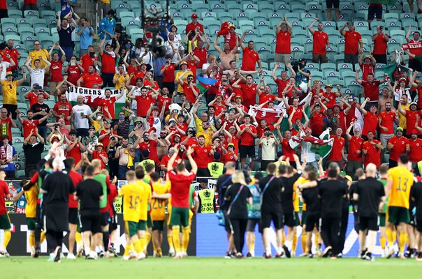 Wales players and fans celebrate v Turkey Baku Euro 2020