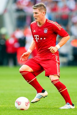 Bastian Schweinsteiger of FC Bayern Muenchen on the ball