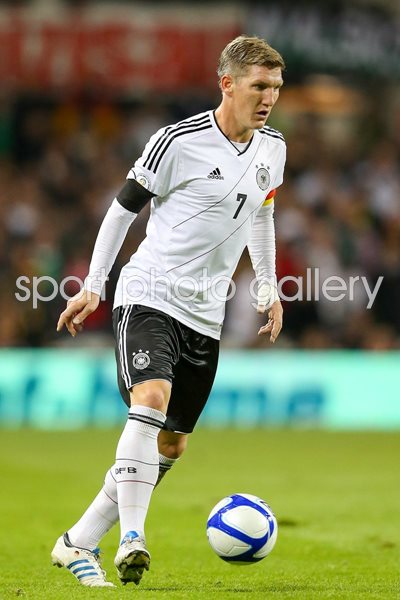 Bastian Schweinsteiger on the ball for Germany