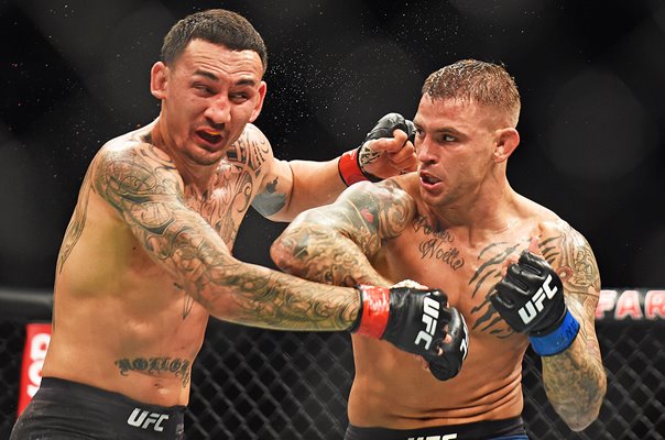 Dustin Poirier punches Max Holloway UFC 236 Atlanta 2019