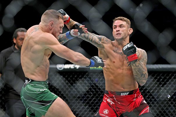 Dustin Poirier punches Conor McGregor UFC 264 Las Vegas 2021