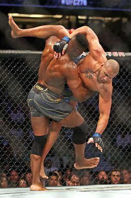 Francis Ngannou Cameroon tackles Ciryl Gane France Anaheim 2022