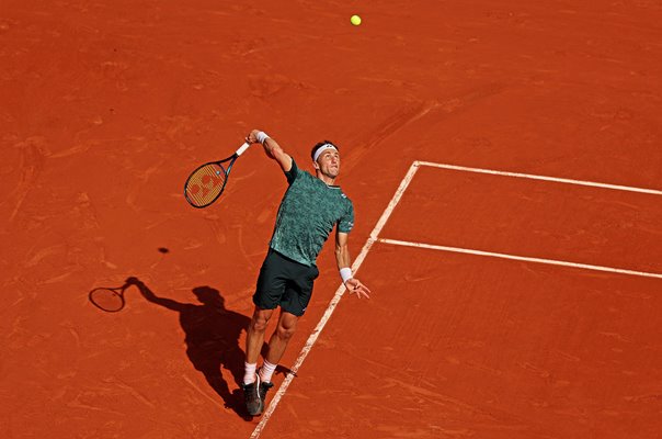 Casper Ruud Norway serves v Rafael Nadal French Open Final 2022