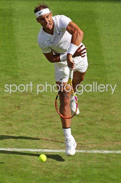 Rafael Nadal of Spain serves Centre Court Wimbledon 2022