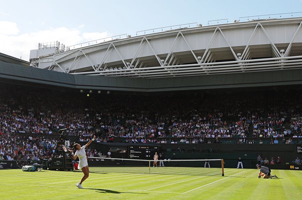Emma Raducanu Great Britain serves Centre Court Wimbledon 2022