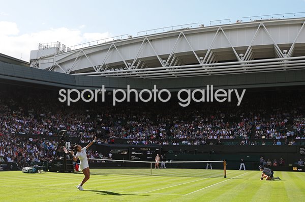 Emma Raducanu Great Britain serves Centre Court Wimbledon 2022