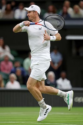 Andy Murray Great Britain plays a forehand Wimbledon 2022