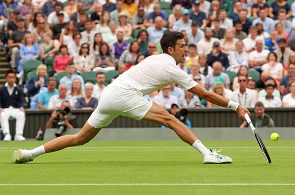 Novak Djokovic Serbia lunge forehand Wimbledon 2022