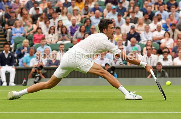 Novak Djokovic Serbia lunge forehand Wimbledon 2022
