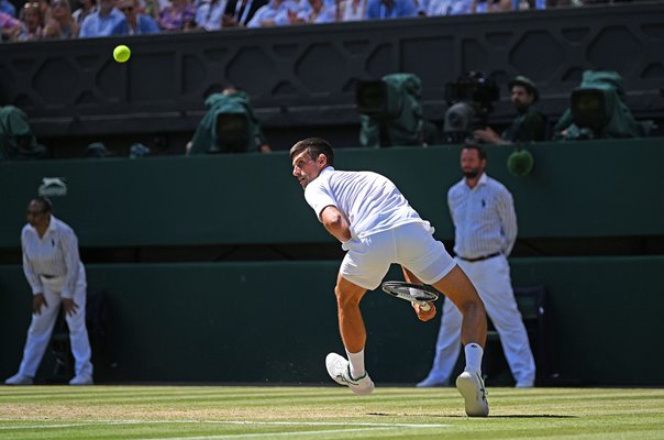 Novak Djokovic trick shot v Cameron Norrie Centre Court Wimbledon 2022