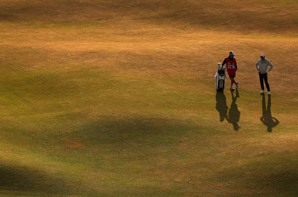 Shugo Imahira Japan and caddie 18th Hole 150th Open 2022