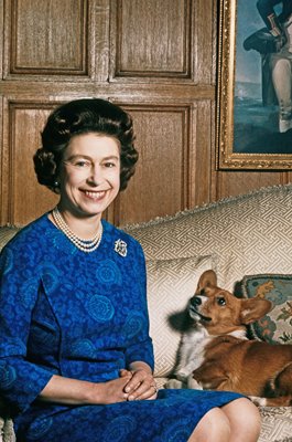 Queen Elizabeth II with one of her corgis at Sandringham 1970