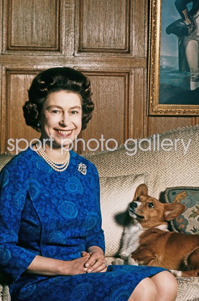 Queen Elizabeth II with one of her corgis at Sandringham 1970