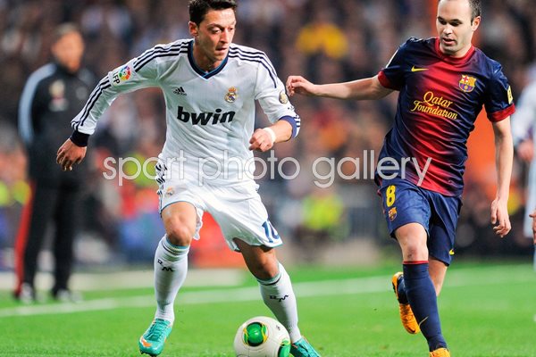 Mesut Ozil of Real v Andres Iniesta of Barcelona 