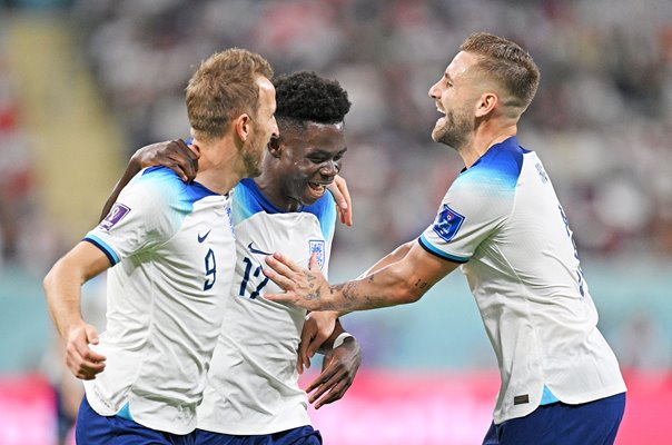 Harry Kane & Luke Shaw celebrate Bukayo Saka goal v Iran World Cup 2022