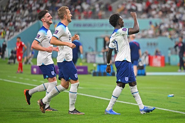 Harry Kane & Declan Rice celebrate Bukayo Saka goal v Iran World Cup 2022