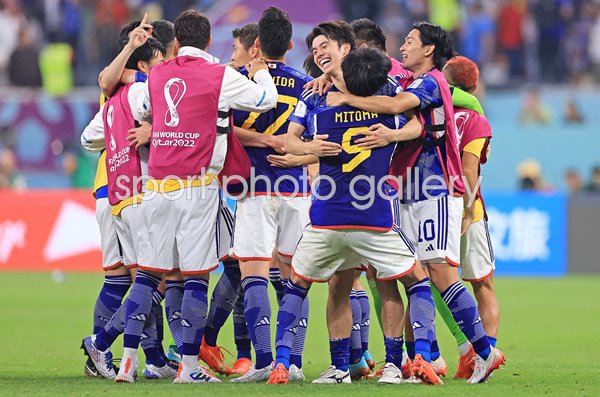 Japan celebrate win v Spain and progress from Group E World Cup 2022