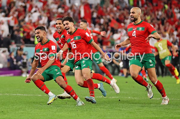 Morocco players celebrate v Spain Last 16 World Cup Qatar 2022