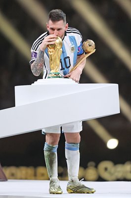Lionel Messi Argentina kisses World Cup Trophy Qatar 2022