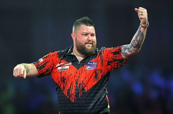 Michael Smith England celebrates 9 dart finish World Darts Final London 2023