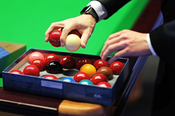 Snooker referee sorts snnoker balls Masters Final London 2023