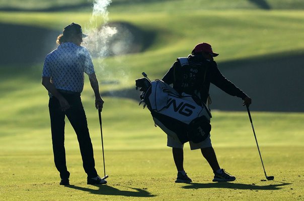 Miguel Angel Jimenez Spain smokes his cigar Dubai Desert Classic 2023