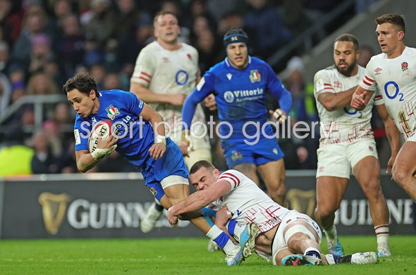Ange Capuozzo Italy tackled by Ben Earl England Six Nations 2023