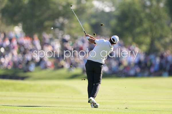 Scottie Scheffler USA iron shot The Players TPC Sawgrass Florida 2023