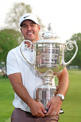 Brooks Koepka USA hugs Wanamaker Trophy USPGA Oak Hill CC 2023