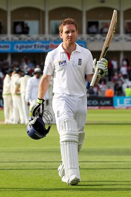 Eoin Morgan salutes the crowd after 100