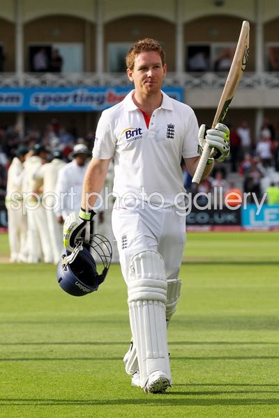 Eoin Morgan salutes the crowd after 100
