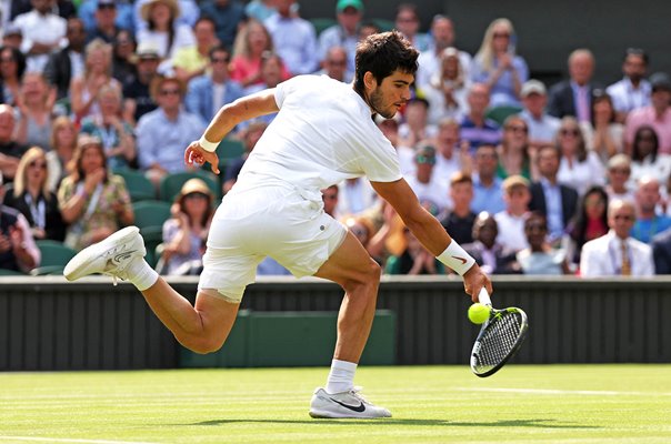 Carlos Alcaraz Spain backhand action Wimbledon Final 2023