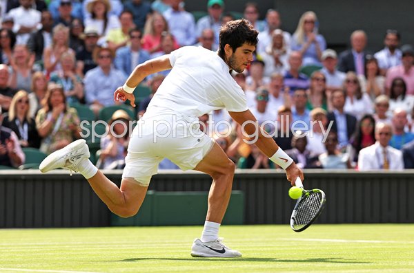 Carlos Alcaraz Spain backhand action Wimbledon Final 2023