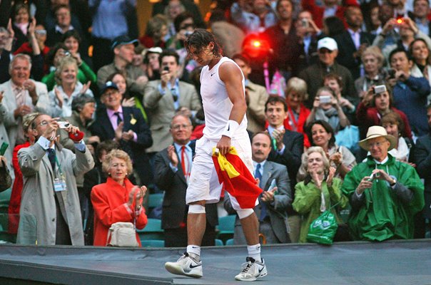 Rafael Nadal Spain climbs into the stands to celebrate winning Wimbledon 2008  