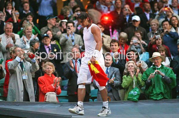 Rafael Nadal Spain climbs into the stands to celebrate winning Wimbledon 2008  