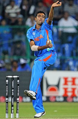 Ravi Ashwin India bowls v Australia World Cup warm up Bangalore 2011