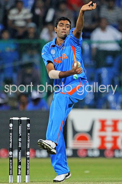 Ravi Ashwin India bowls v Australia World Cup warm up Bangalore 2011