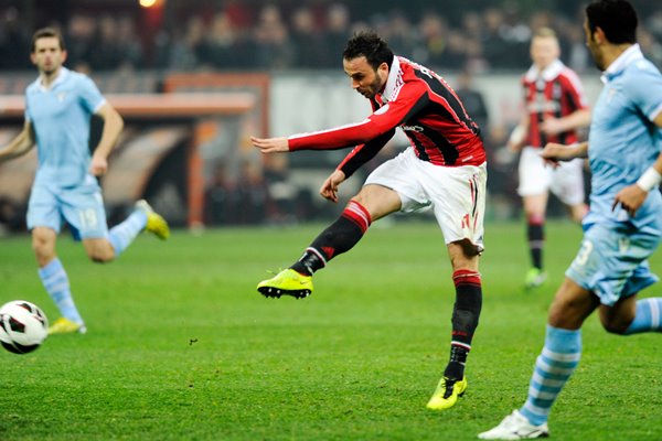 Giampaolo Pazzini of AC Milan scores