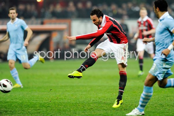 Giampaolo Pazzini of AC Milan scores