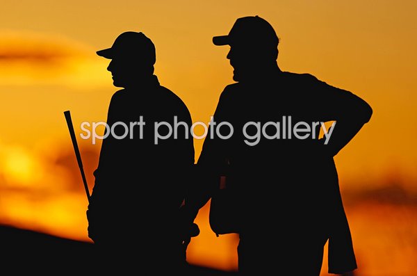 Jordan Spieth & caddie Michael Greller silhouette Phoenix Open 2024
