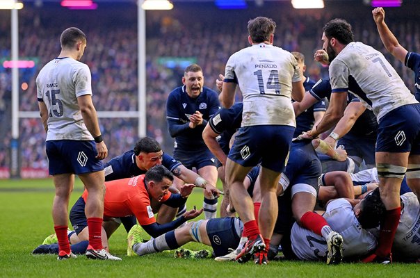 Referee Nic Berry signals held up Scotland v France Murrayfield Six Nations 2024