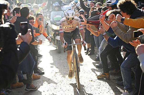 Tadej Pogacar Slovenia rides through crowds of fans Strade Bianche 2024