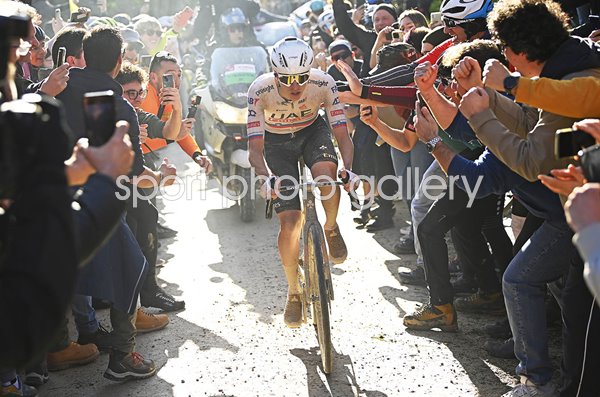 Tadej Pogacar Slovenia rides through crowds of fans Strade Bianche 2024
