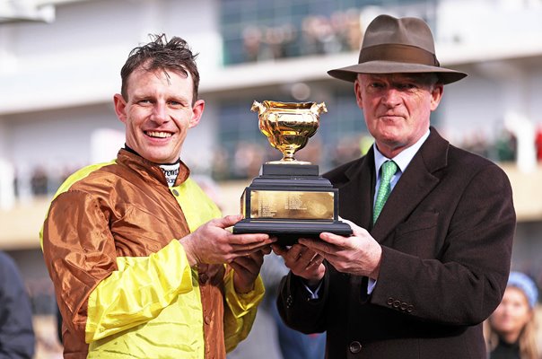 Winning jockey Paul Townend celebrates with trainer Willie Mullins Gold Cup Cheltenham 2024 