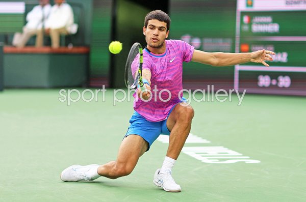 Carlos Alcaraz Spain crouch backhand v Jannik Sinner Indian Wells 2024