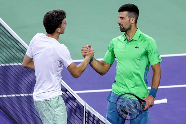 Luca Nardi Italy congratulated by Novak Djokovic BNP Paribas Open 2024 