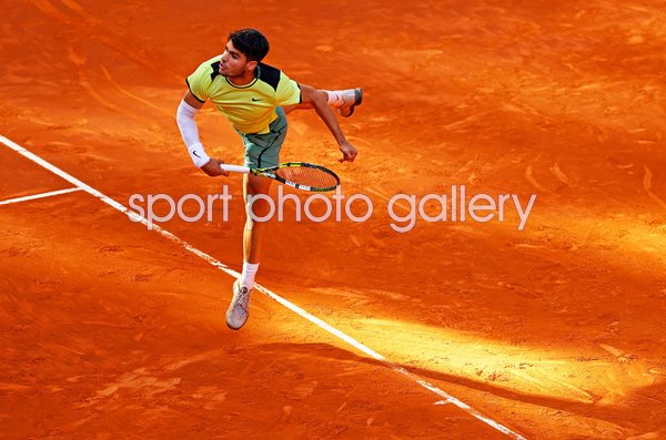 Carlos Alcaraz Spain serves clay court Madrid Open 2024